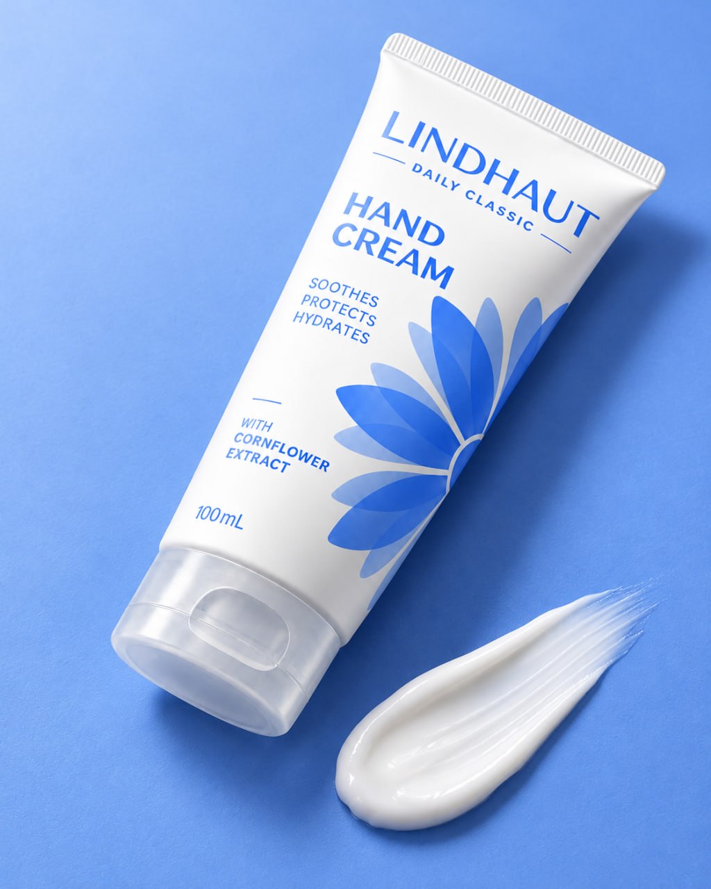 LINDHAUT Daily Classic hand cream with a white cream swatch on a cornflower-blue background